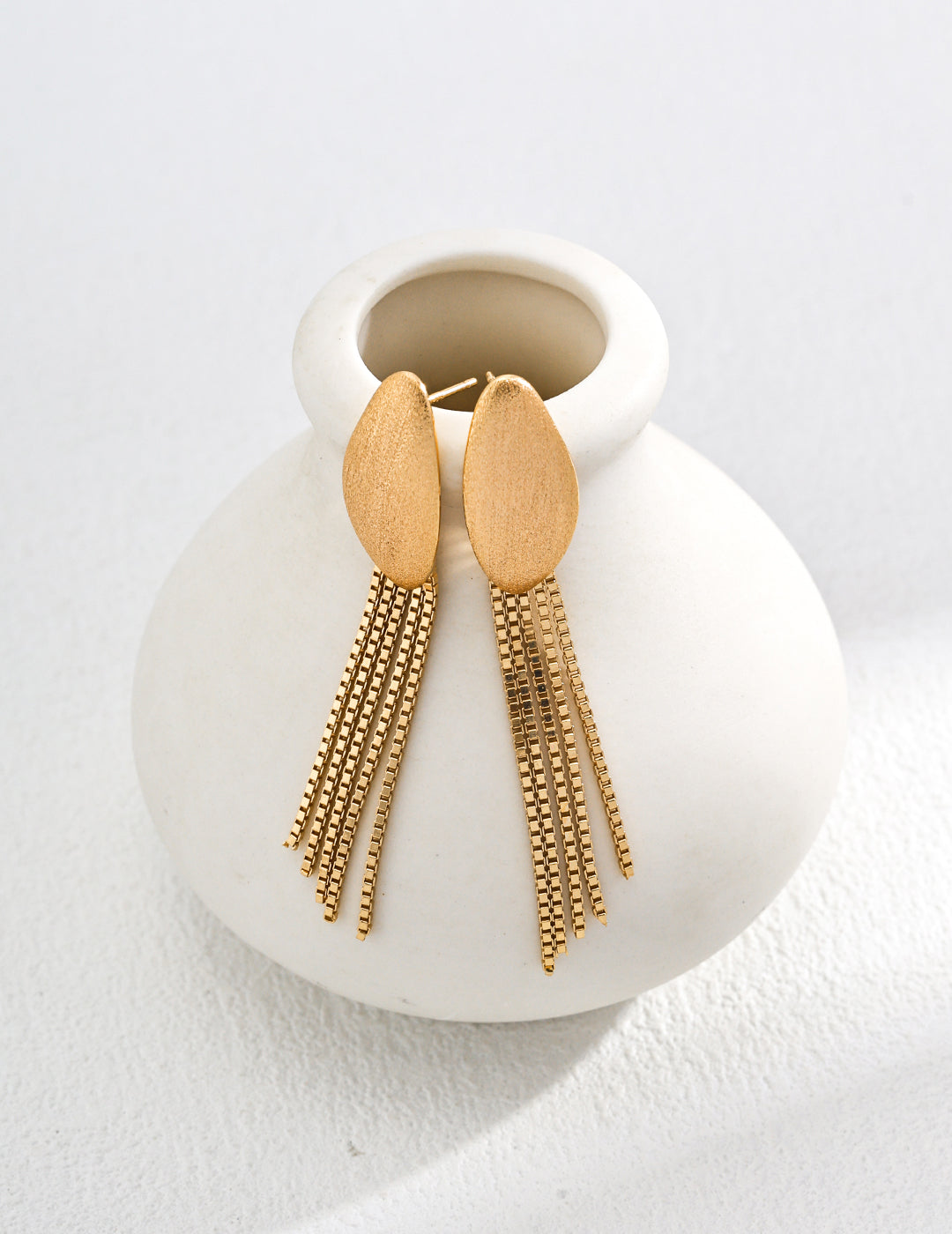 Plain silver retro gold tassel simple earrings